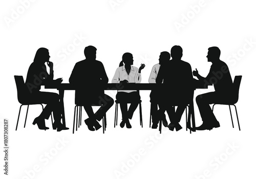 A group of silhouetted people seated around a conference table
