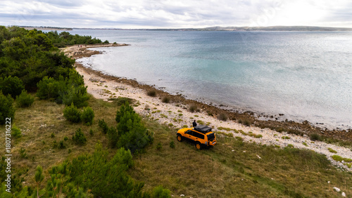 Fototapeta Naklejka Na Ścianę i Meble -  Remote Croatian Beaches Accessible Only by Off-Road Vehicles. Rugged coastline, untouched nature, wild Mediterranean landscapes and secluded turquoise shores captured from above