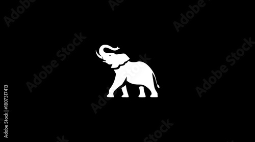 Majestic white elephant silhouette with trunk raised on a stark black background. Minimalist wildlife graphic design element.