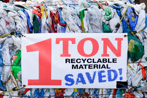 Santa Fe, New Mexico, United States. Collection point for recycled goods. Bundle of recycled plastic with sign saying 1 Ton of Recycled Material Saved 