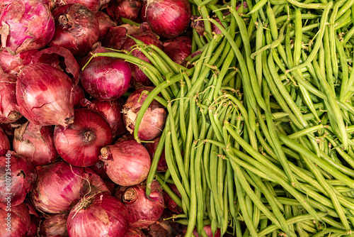Fresh Red Onions and Green French Beans at a Kenyan Market displayed at a vibrant Kenyan market stall
