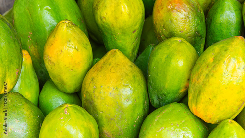 Ripe and Juicy Yellow Pawpaws at a Kenyan Market Stall

Ripe, juicy yellow pawpaws displayed at a busy Kenyan market stall, highlighting fresh tropical fruit and vibrant local produce