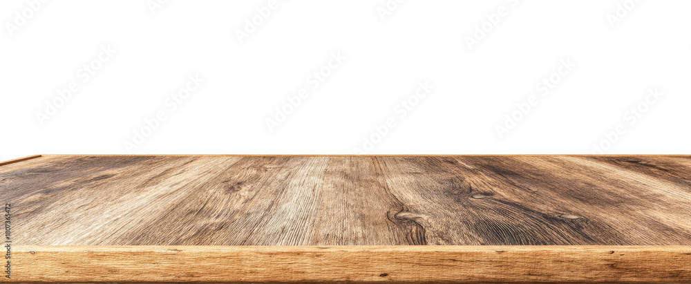 Fototapeta premium Close-up of a wooden table top against a black background. The table has a light brown/tan wood grain pattern and a light brown/tan edge
