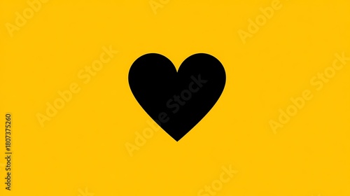 Striking black heart icon prominently featured against a bold, bright yellow background, conveying deep emotion