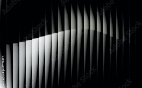 Dramatic light and shadow play across abstract vertical panels, creating a sense of depth and mystery in a dark environment