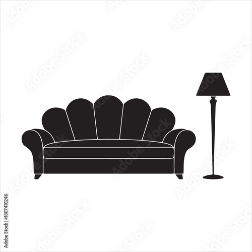  Black silhouette of a scalloped sofa and a tall floor lamp white couch