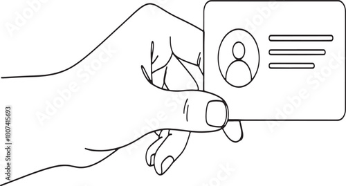 Hand holding an identification card