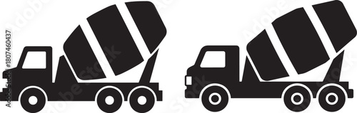 Two cement mixer trucks silhouette