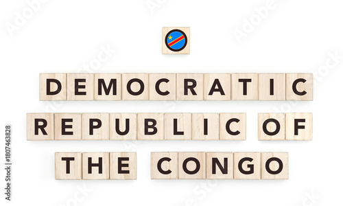 Wooden blocks bearing the name and flag of Democratic Republic of the Congo. Congolese and African Culture, national identity, travel, and geography in a copy space design.