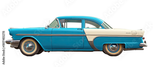 Side view of a classic turquoise and cream-colored coupe