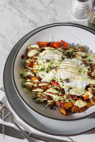 corned beef hash with eggs in hard light