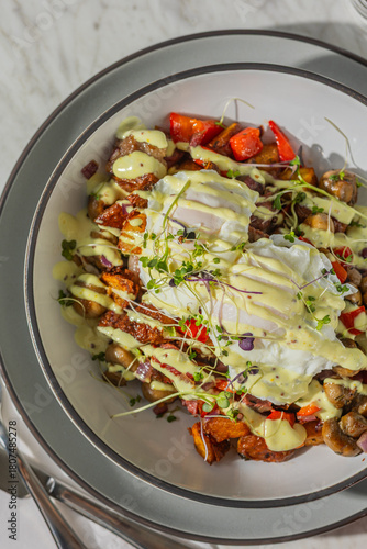 corned beef hash with eggs in hard light