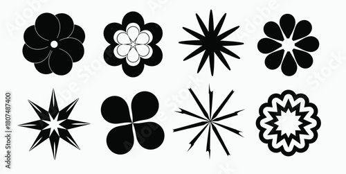 set of black silhouettes of flowers with white background.