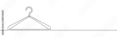 A continuous one-line drawing of a clothes hanger, ready to hold garments, against a clean white background