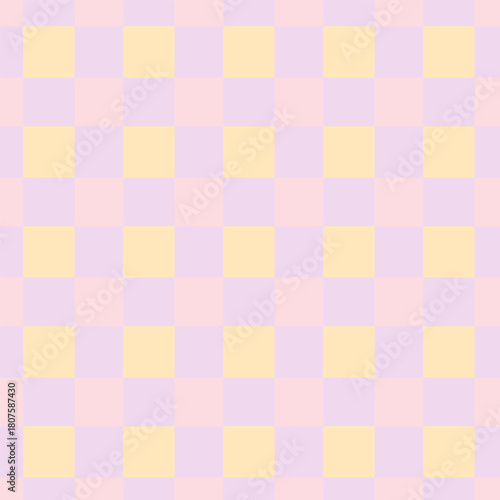 Seamless pastel checkered pattern with alternating yellow and pink-lilac squares. Simple geometric background for textile, wallpaper, and print design.