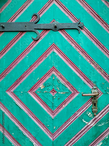 Old wooden door with colourful paint