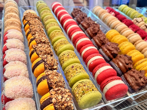delicious dessert for tea colorful macaroons in the shop window. High quality photo
