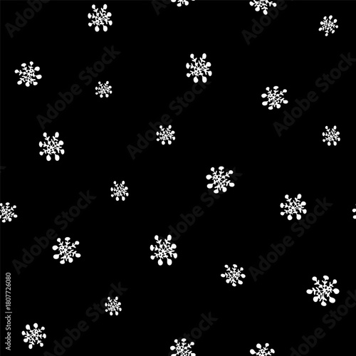 Monochrome winter seamless pattern with small silhouettes of white snowflakes on black. Greeting card, gift packaging, package, holiday wrapping paper. Funny scrabble collection for happy new year. 