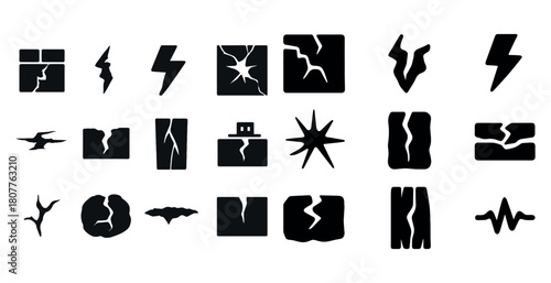 Collection of abstract black crack and lightning shapes on white background