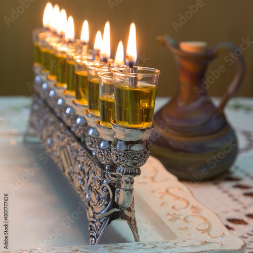 Lighting candles for the holiday of Hanukkah