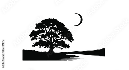 Serene silhouette of a majestic tree under a crescent moon by tranquil water