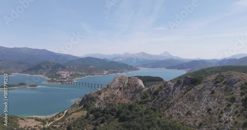 Aerial drone shot of Riaño and the Picos de Europa mountains.