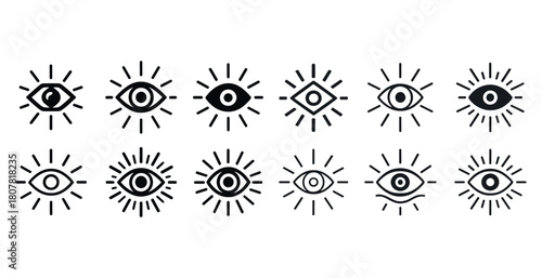Set of geometric eye symbols with sunburst patterns in black and white