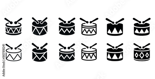 Set of twelve black and white drum icons with drumsticks in various patterns