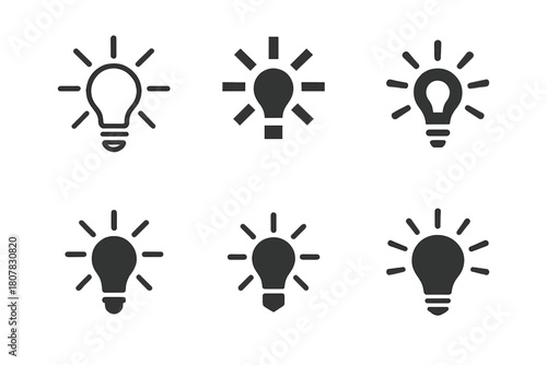 Flash of Brilliance Icons. Flash of brilliance. Icon set. Set Logo of flash of brilliance: glowing light bulb emitting dynamic rays. harmonious logo variations
