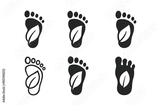 Carbon Footprint Icons. Climate change action. Icon set. Set Logo of Carbon Footprint: Foot with leaf. Negative space, Minimal outline, Symmetrical form,