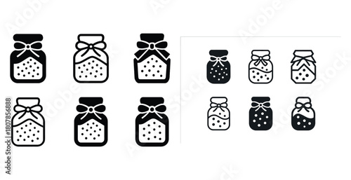 Collection of decorative jars with bow and dotted pattern designs