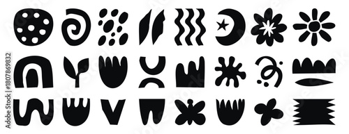 Abstract doodle elements with spirals, plants and wavy lines in naive style. Monochrome line art, hand drawn.