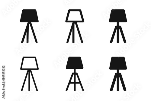 Floor Lamp Icons. Floor lamp. Icon set. Set Logo of Floor lamp: Tripod lamp. harmonious logo variations of the same emblematic concept (Negative space,