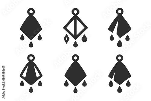 Wet Towel Logos. Wet towel. Icon set. Set Logo of Wet Towel: rolled towel with droplets accent. harmonious logo variations of the same emblematic concept, each