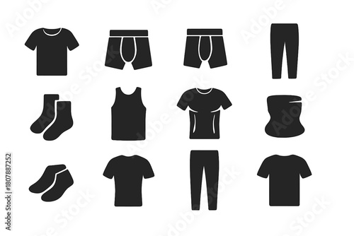 Seamless Menswear Icons. Seamless Menswear. Solid icon set of Seamless Menswear: base layer tee, boxer brief, trunks, long johns, crew socks, tank vest,