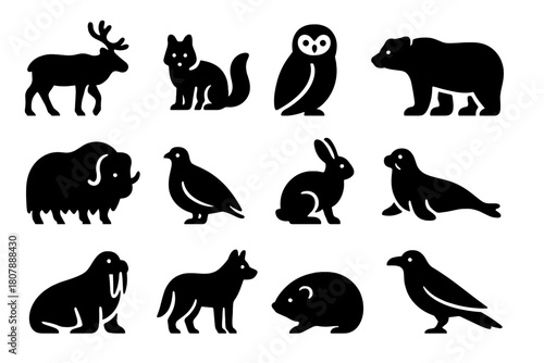 Arctic Wildlife Icons. Arctic Wildlife. Solid icon set of Arctic Wildlife: caribou, arctic fox, snowy owl, polar bear, musk ox, ptarmigan, hare, seal, walrus,