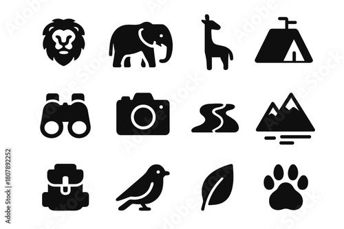 Wildlife Adventure Icons. Wildlife adventure. Solid icon set of Wildlife adventure: lion, elephant, giraffe, binoculars, camera, tent, backpack, river,