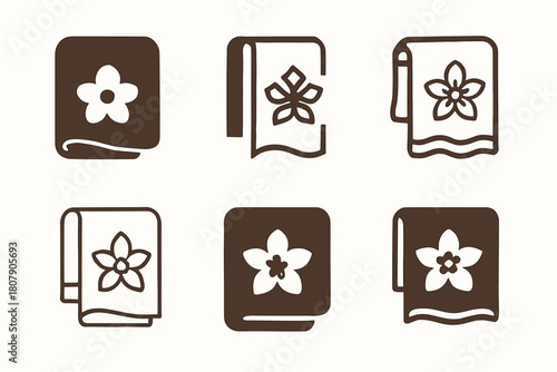 Spa Towel Logos. Changing towels. Icon set. Set Logo of spa refresh: towel with flower emblem. harmonious logo variations of the same emblematic concept, each