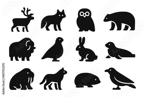 Arctic Wildlife Icons. Arctic Wildlife. Solid icon set of Arctic Wildlife: caribou, arctic fox, snowy owl, polar bear, musk ox, ptarmigan, hare, seal, walrus,