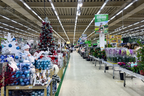 Preparation for Christmas and New year winter holiday concept. Sale of Christmas decorations in shopping mall. Store of Christmas symbols and accessories.