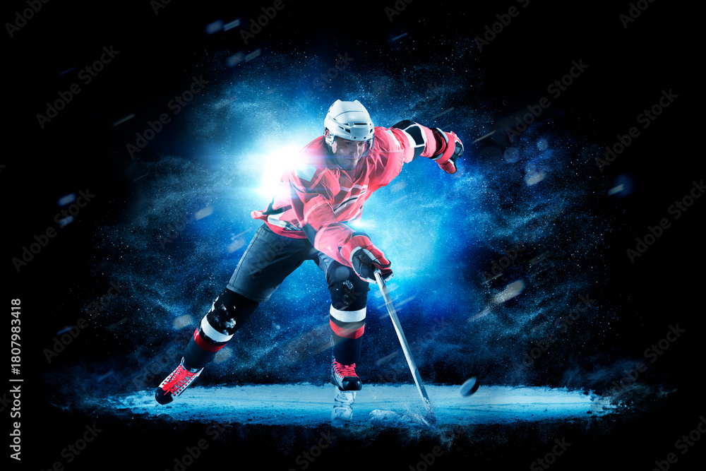 Fototapeta premium Hockey. Hockey players on a beautiful black background with a flash of light behind them. Isolated on a black background. Sports