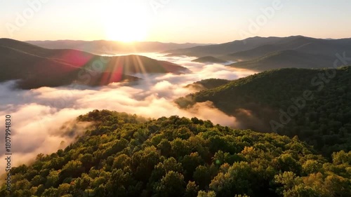 Sunrise Over Misty Mountains A Breathtaking Aerial View.