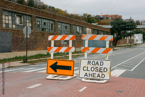 Εκτύπωση καμβά Road closure signs direct traffic on a quiet urban street beside brick buildings
