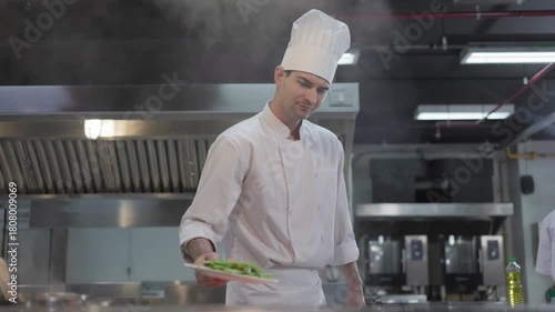 man chef preparing food, Chef cooking with pan in the kitchen