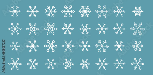 Hand drawn snowflake doodle vector icon collection, winter snow symbol. White snowflakes on a blue background