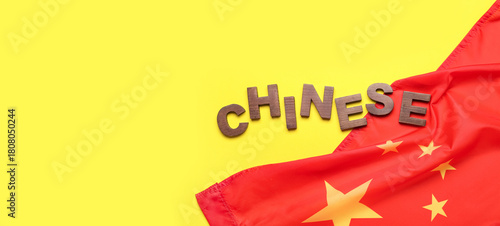 Word CHINESE and flag on ye...