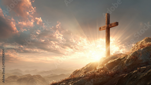 Wooden cross on hill at sunrise with radiant light and dramatic sky evoking hope and faith