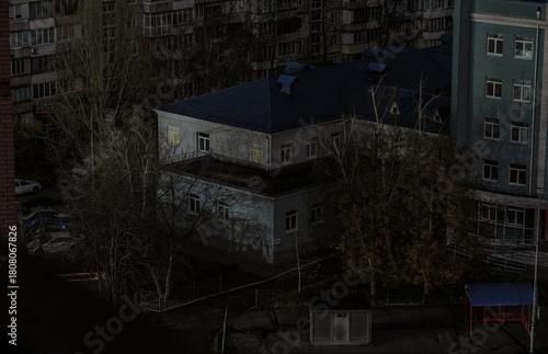 Residential complex and courtyard at night in Ukraine, darkened due to power outage