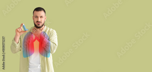 Young man with inhaler havi...
