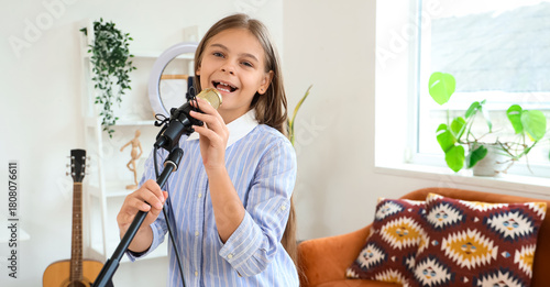 Little girl with microphone...